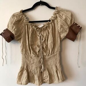 BELLE Pogue tan lace up top with faux leather sleeve cuffs.  Size small.
